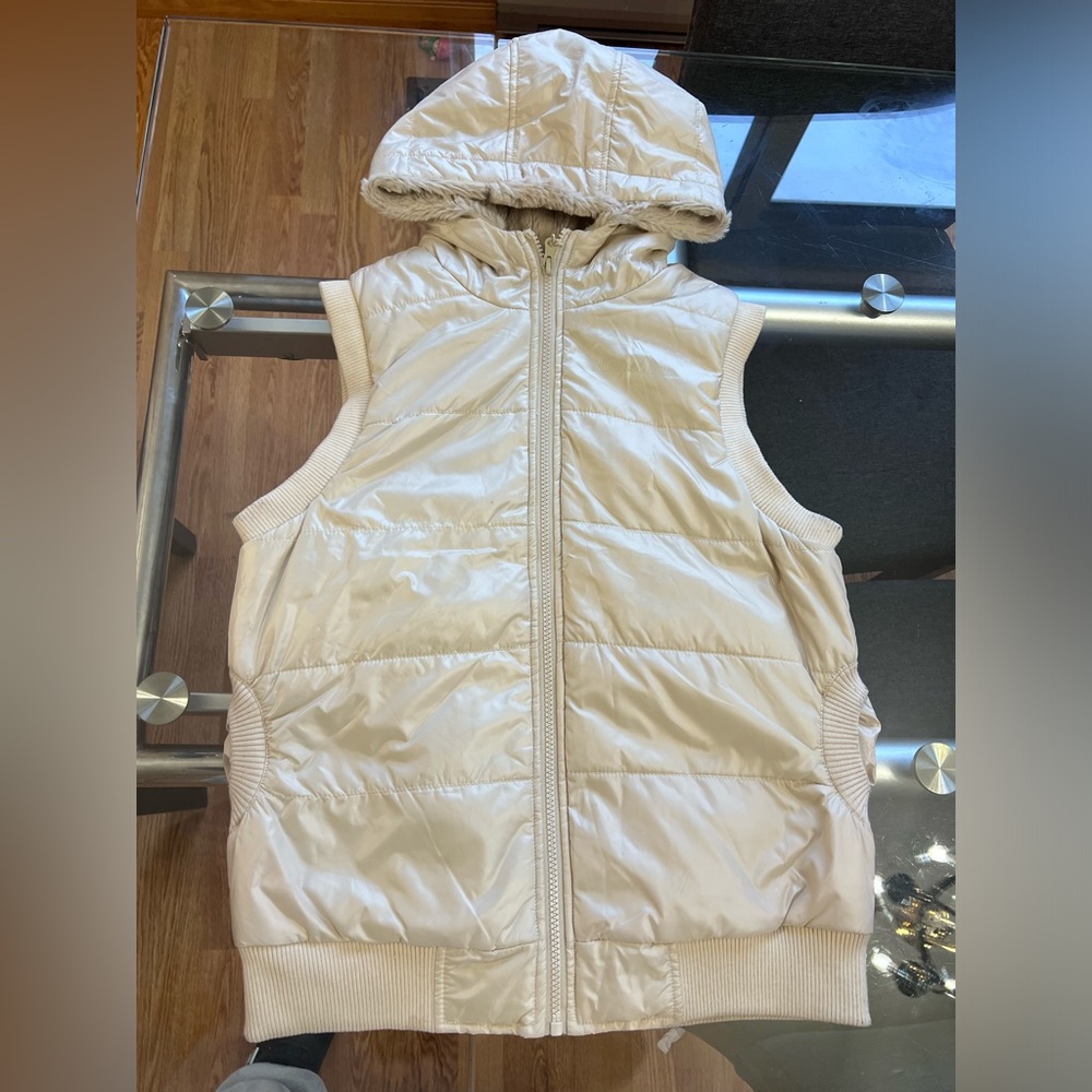 Puffer vest with faux fur hood